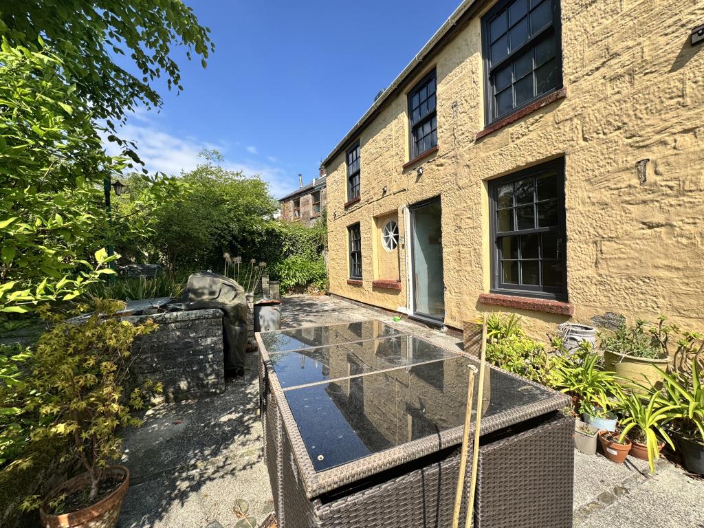 Lot: 157 - THREE-BEDROOM DETACHED COTTAGE - Sun terrace, looking across the gardens